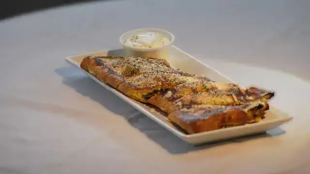 Delicious bread flavoured with our home-made donair seasoning Delicious bread flavoured with our home-made donair seasoning